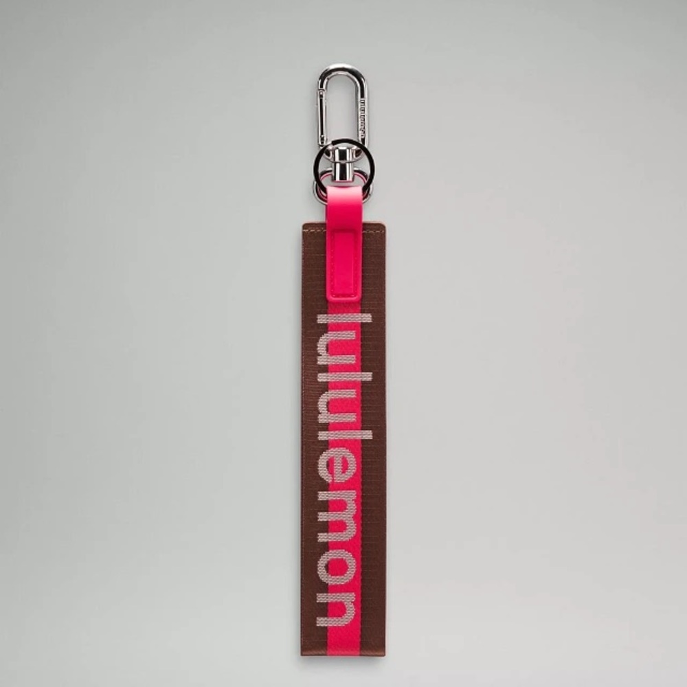 NWT lululemon athletica Pink and Brown Never Lost keychain